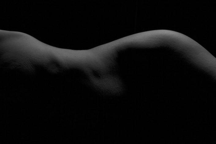 Bodyscape of a woman in black and white