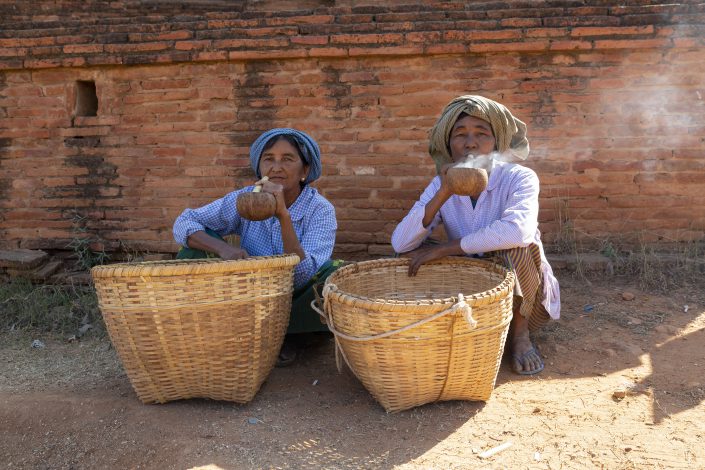 Two women smoking, Bagan, Myanmar